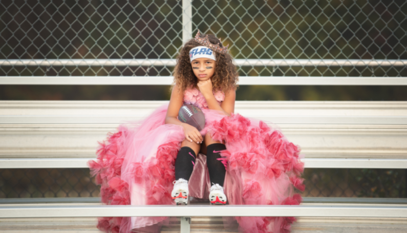 Daughter playing football