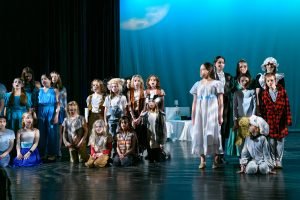children performing Peter Pan on stage 