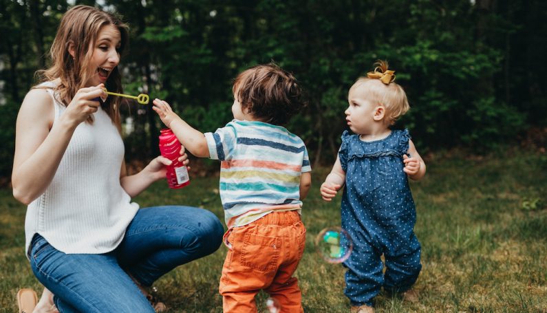 Woman blowing bubbles