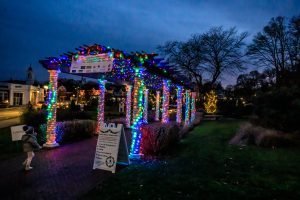 Trellis covered in multi-colored Christmas lights