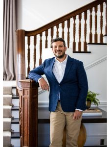 Dave Supple leaning on staircase