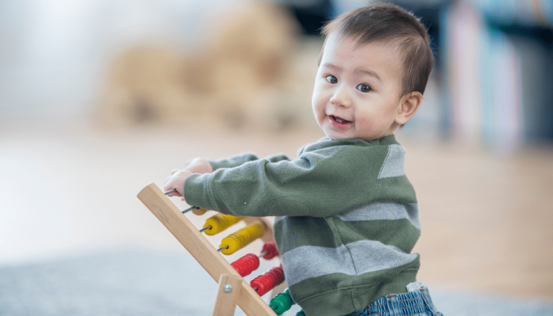 toddler playing (navigating Early Intervention Massacbusetts)