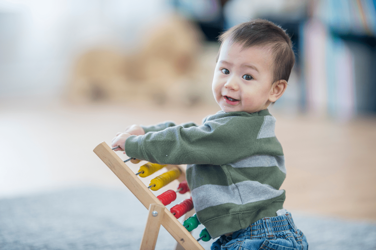 toddler playing (navigating Early Intervention Massacbusetts)