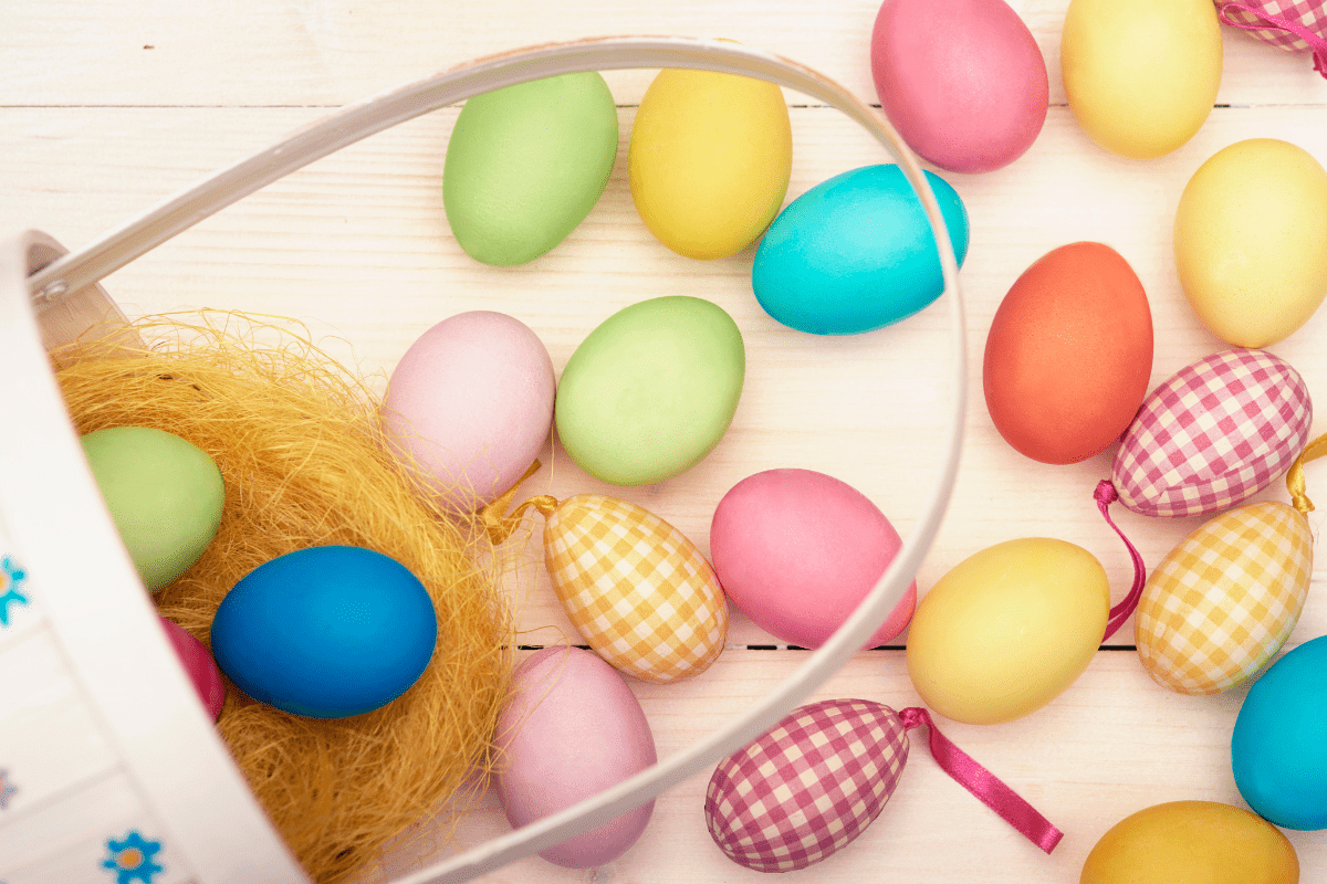 Easter basket with colored easter eggs
