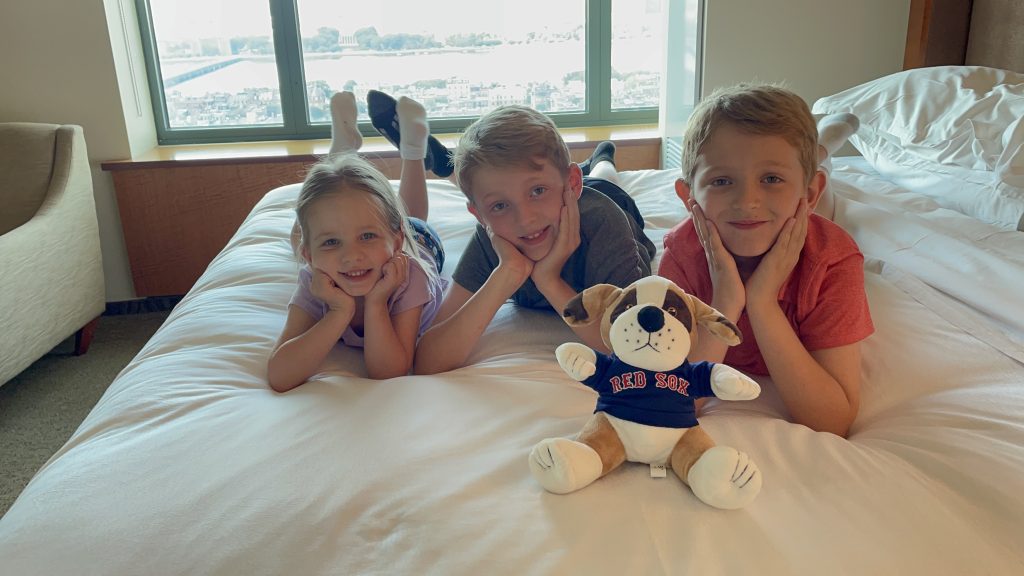 Sheraton Staycation kids on bed