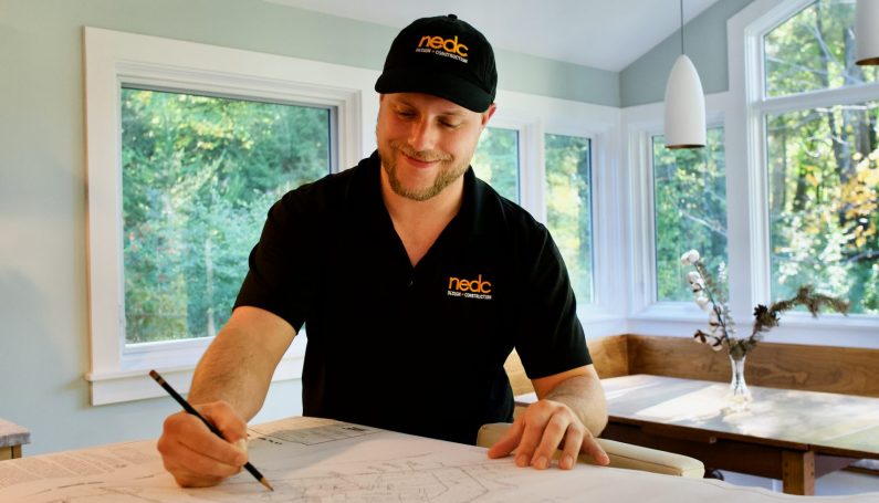 NEDC designer sketching on paper