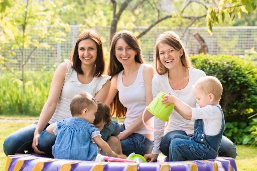 Suburban moms with their babies