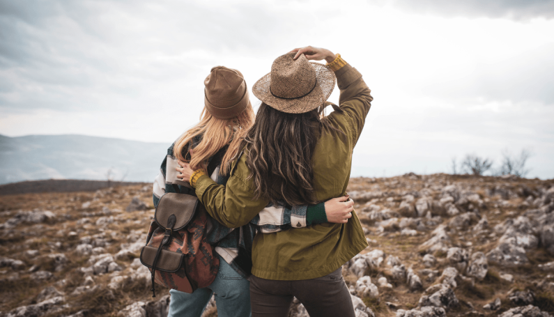 two women hiking, showing an idea for a friend date without drinks