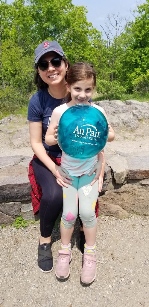 Au Pair playing with child