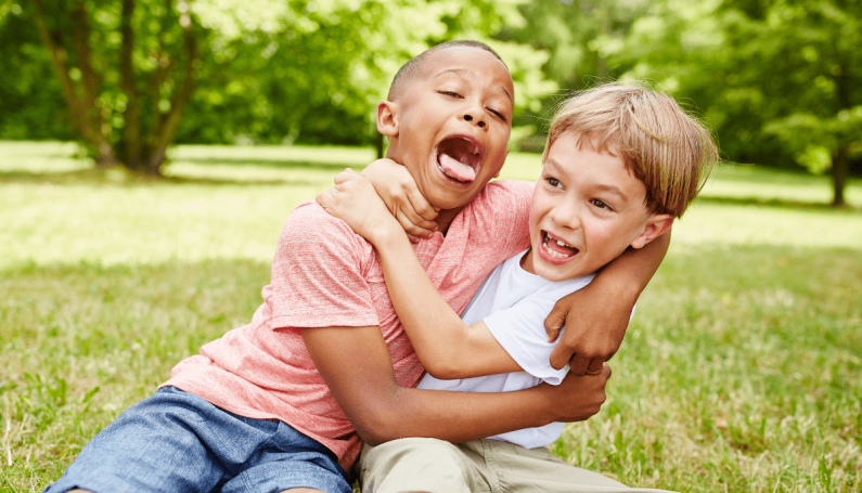 boys playing and fighting, aggressive play