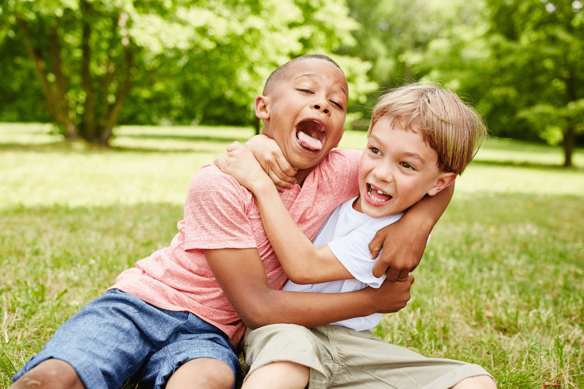 boys playing and fighting, aggressive play