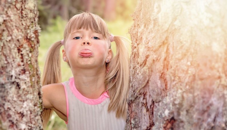 girl sticking tongue out