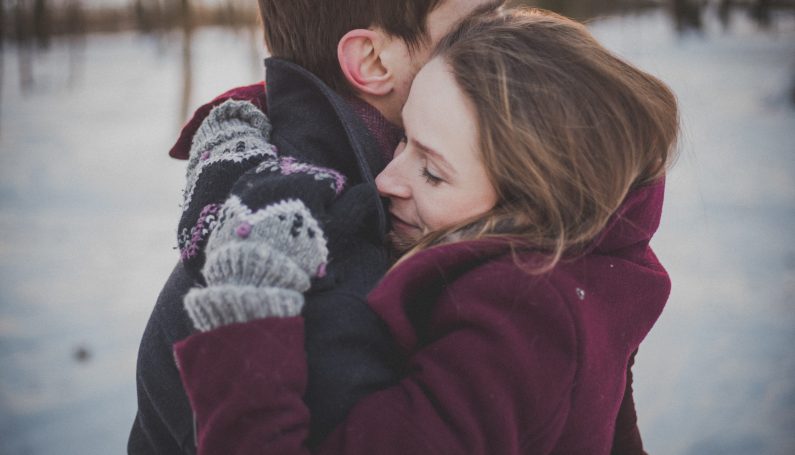 couple embracing (seasonal depression spouse partner)