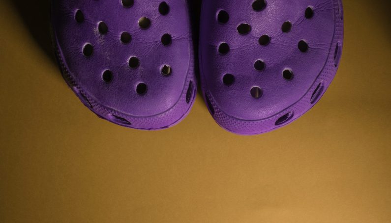 pair of purple crocs