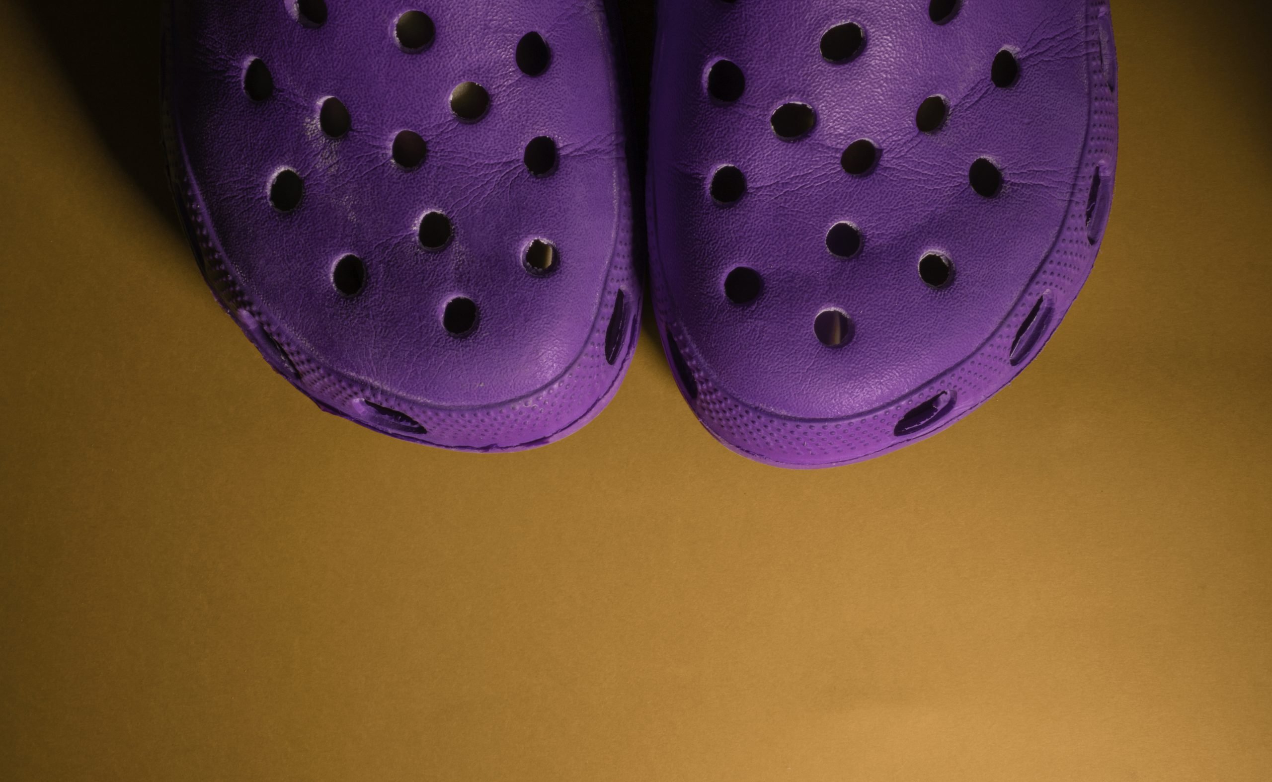 pair of purple crocs