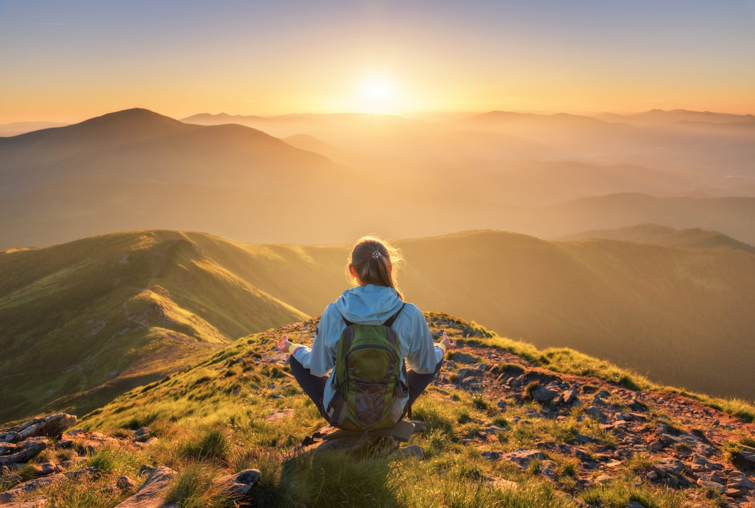 woman alone on mountain top (selfless mother)