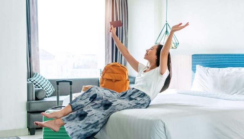 woman relaxing at hotel (mom taking overnight break)