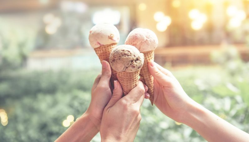 people's hands holding ice cream cones (ice cream shops Boston South Shore)