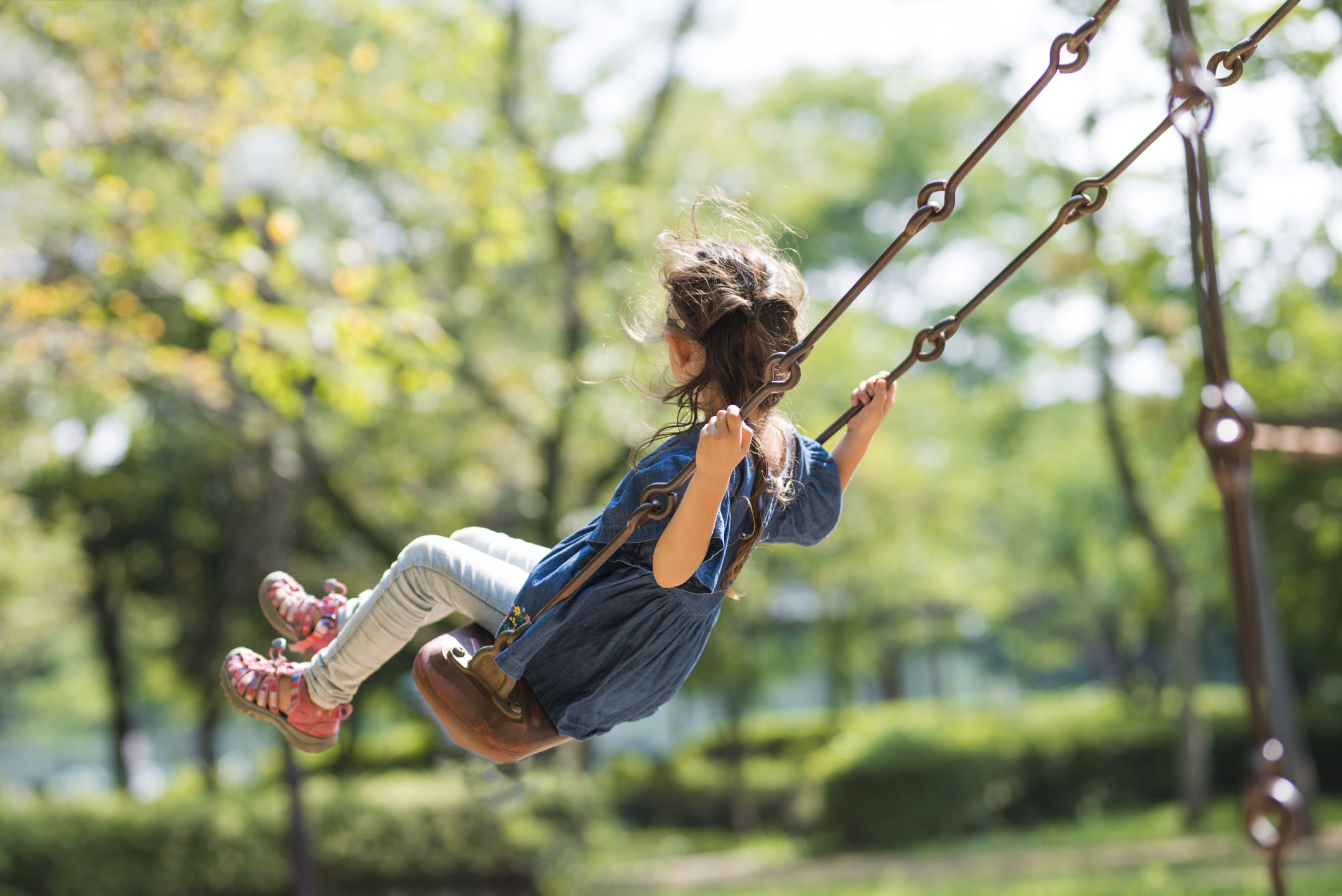 Little girl swinging (ADHD in girls)
