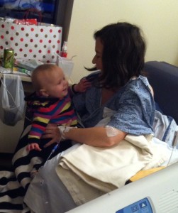 "Well, hello there, stranger!" Reunited with my baby for the first time post-surgery.