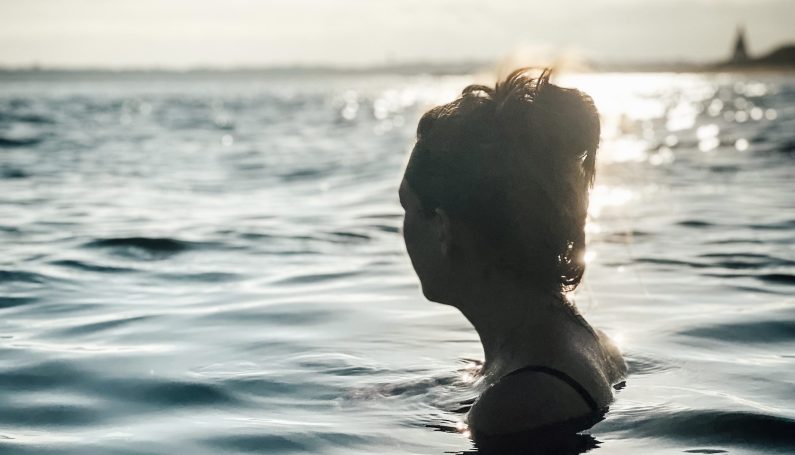 woman doing a cold plunge in Boston