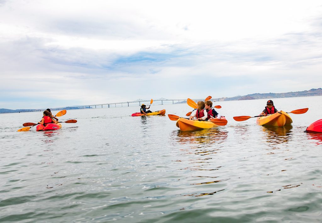 children kayaking