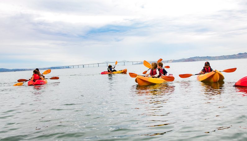 children kayaking