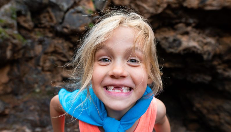 Photo of child without two front teeth (tooth fairy tips)