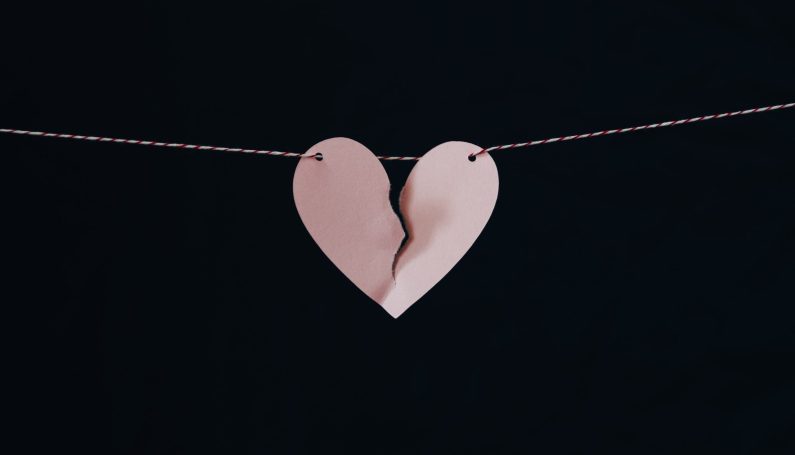 paper heart cut in half — resources for moms during divorce