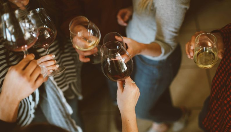 group of people with wine glasses, date night restaurants Newburyport Massachusetts