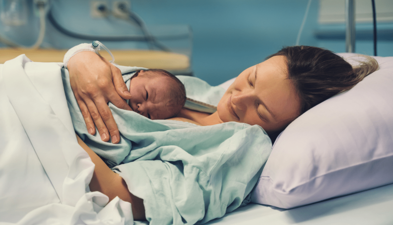 mother and newborn at hospital (labor and delivery and recovery pains after childbirth)