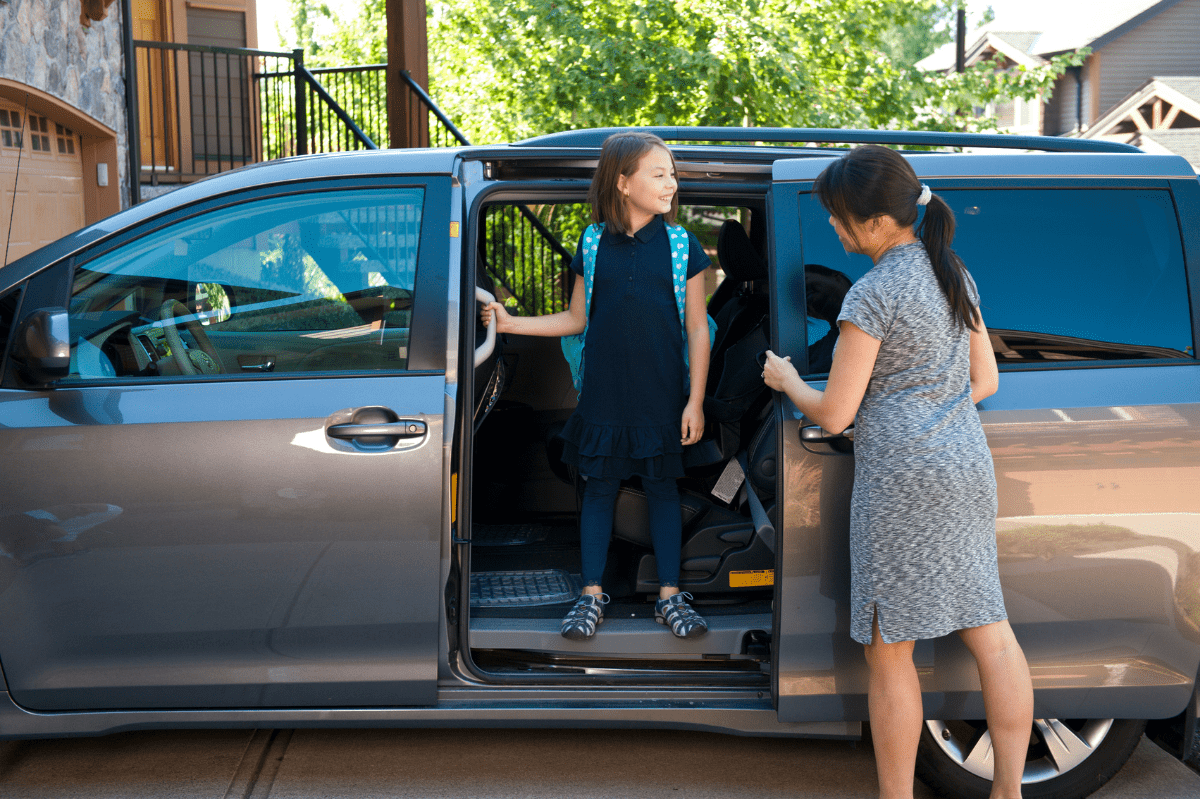 minivan mom with child
