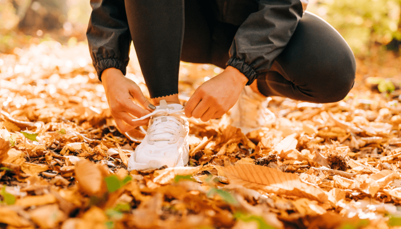 woman tying her sneakers, mom sneakers