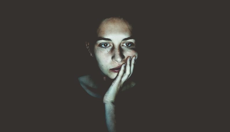 woman looking serious or sad (mid-life crisis, worrying about how i'll be remembered)