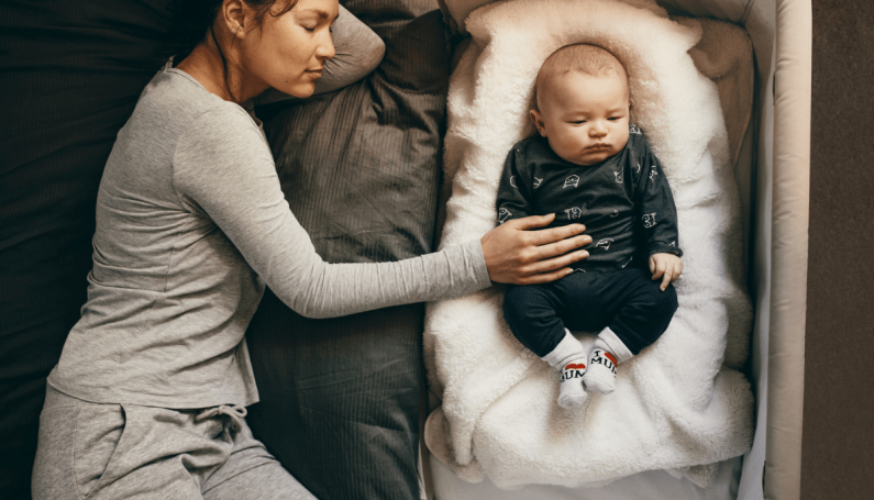 mother and baby sleeping (sleep deprived mom)