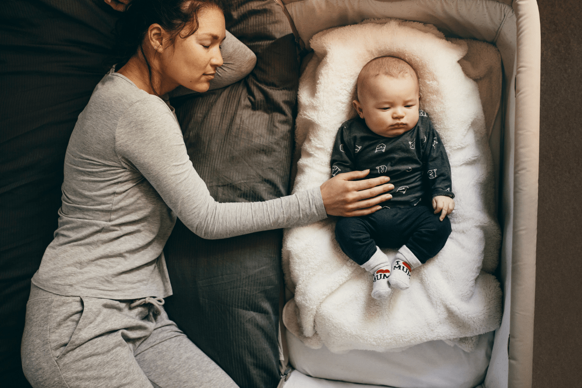mother and baby sleeping (sleep deprived mom)