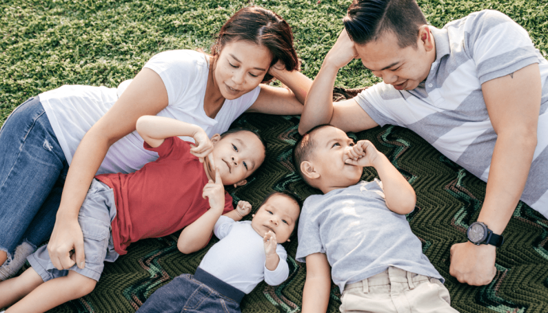 family of five — two parents and three kids