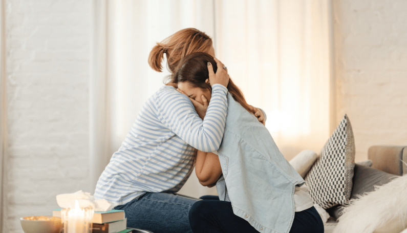 two women hugging (what to say to someone who has had a miscarriage)