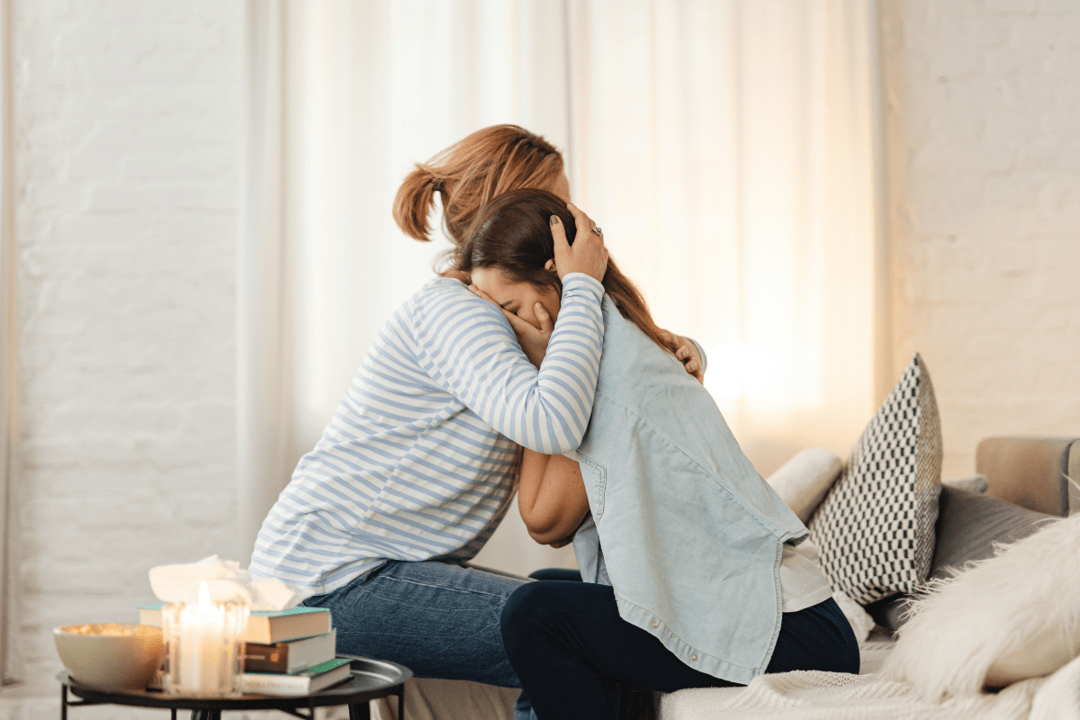 two women hugging (what to say to someone who has had a miscarriage)