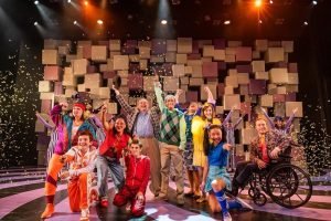 kids on stage in a theater production