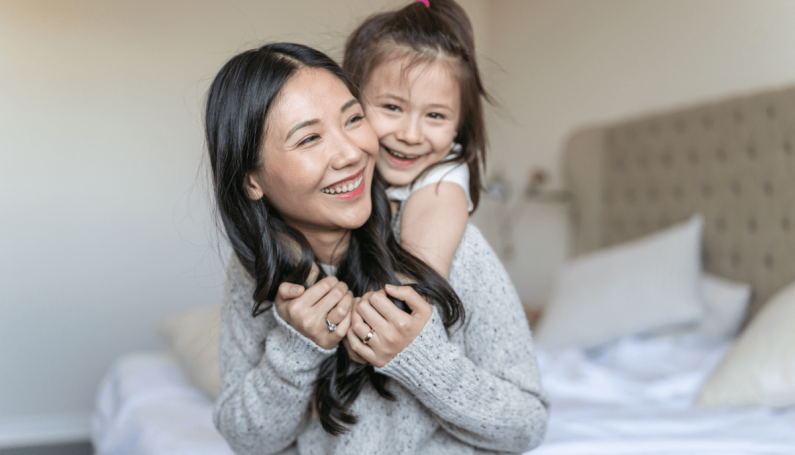 mom and daughter hugging (from working mom to stay-at-home mom)